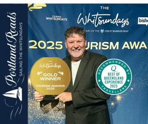 John Linton with Best Bareboat Operator trophy at Tourism Whitsundays Awards in 2025