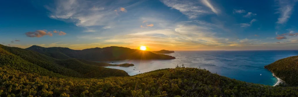 sunset with boats anchored in inlets