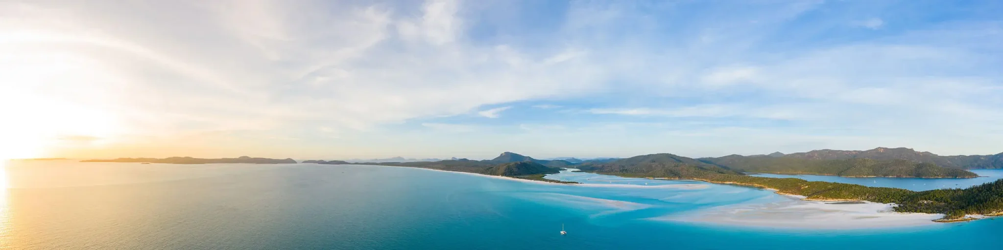 lone catamaran at whitehaven beach